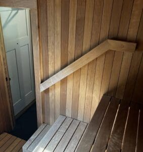 Seating interior of a custom backyard sauna