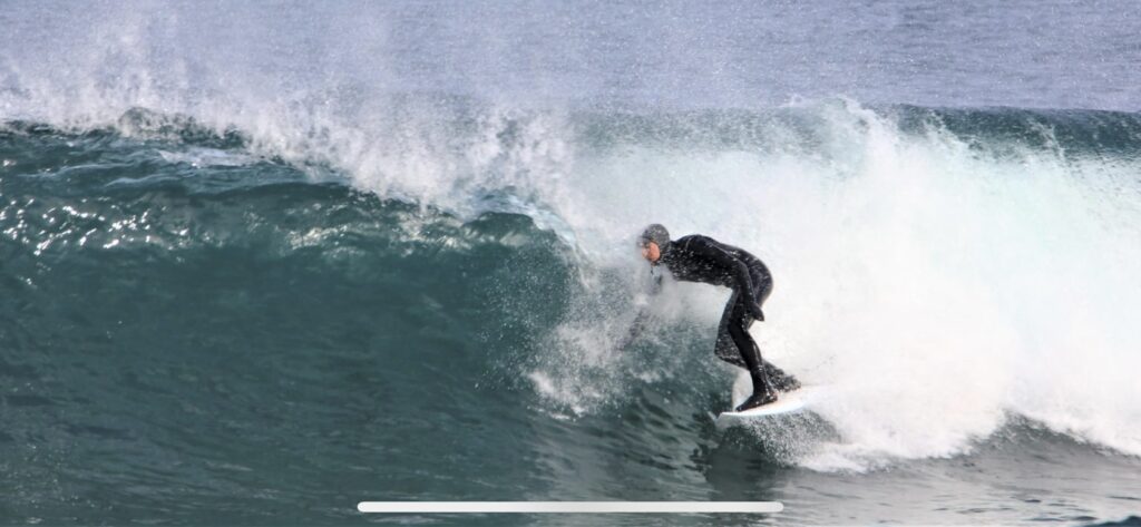 Surfing on Lake Superior in the ice