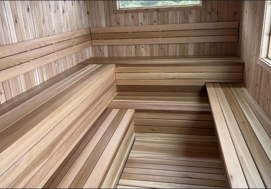 Interior of a custom trailer sauna with cedar interior